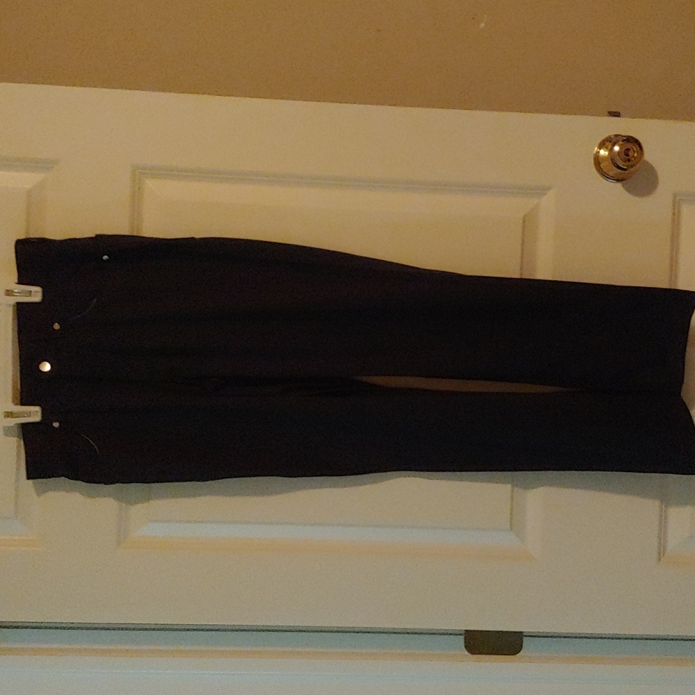 Nwot tags IZOD pants 14 red pockets front n back beautiful hardware. Wrinklefree